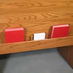 Continuous style bookrack with card and pencil holder